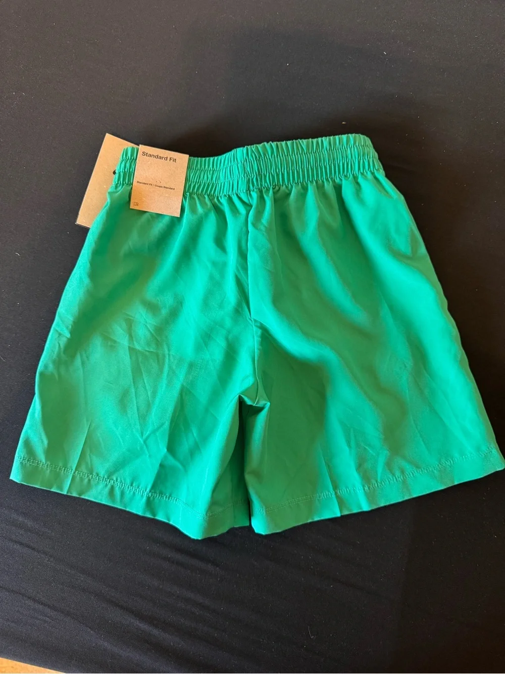 Nike Kids Bright Green Athletic Shorts with White Swoosh - Picture 3 of 3
